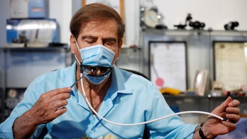 Company creates mechanical face mask to allow wearers to eat without taking it off