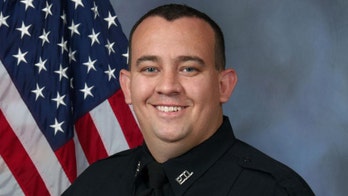 Kansas police department's officer of the year killed in shootout with hit-and-run suspect