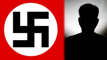Teacher on leave after Nazi accusation; family denies ties