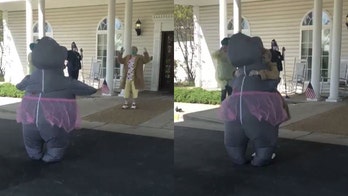 Woman wears inflatable hippo suit to safely hug mom at retirement home: 'This is wonderful!'