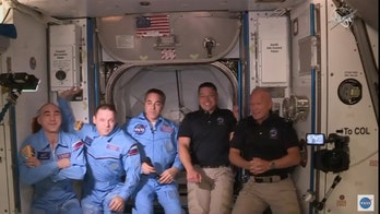 NASA astronauts board International Space Station in historic SpaceX mission