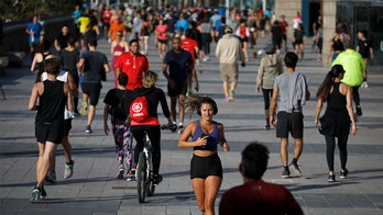 Spanish take to streets in droves as coronavirus lockdown measures eased for first time in weeks
