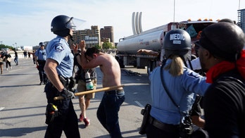 Semitrailer speeds toward crowd of George Floyd protesters on Minneapolis bridge; driver arrested