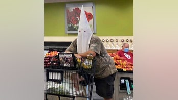 No charges to be filed against California man who went shopping in KKK hood: police