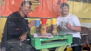 Cafe owner in England drapes tables in clear shower curtains: 'I don't know what else to do'