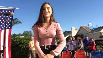 Teen performs anthem for Florida neighbors each night: The song 'means everything'