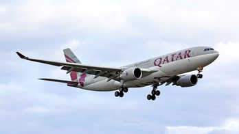 Qatar Airways requiring passengers to wear face mask and shield while onboard