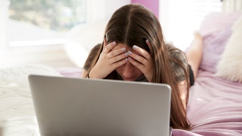 Mom accidentally walks by daughter’s Zoom call naked, recalls story in hilarious Facebook video: 'Humiliating'
