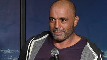 Joe Rogan's podcast debuts on Spotify with controversial episodes missing