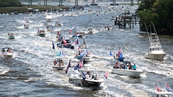 Memorial Day sees MAGA boat parades, busy bars and boardwalk shootings as Americans adapt to changing social distancing norms