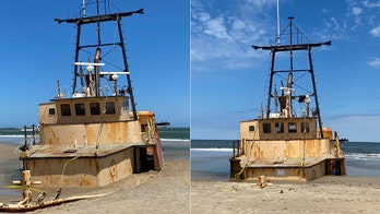 Eerie photos show Outer Banks shipwreck sinking into sand