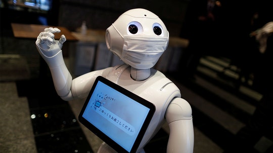 Tokyo unveils robots that will serve coronavirus patients at hotels