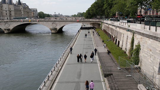 Paris bans alcohol by Seine River as crowds violate social distancing after coronavirus lockdown lifted