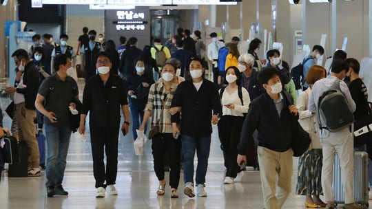 South Korea restores coronavirus lockdown restrictions after new spike in cases
