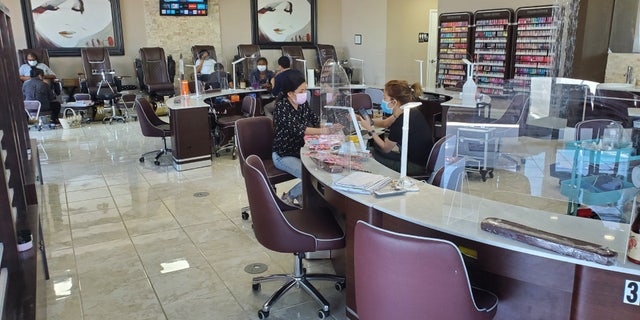 Allure Nail Spa takes precautions such as the use of masks and plexiglass barriers between technicians and customers.