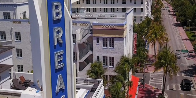 Busy beaches packed with eager visitors are the new reality in Florida as most of the state reopens. But in vacation city Miami, it’s still a ghost town.