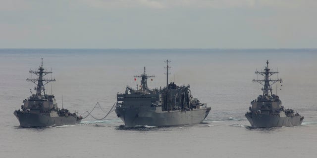 The USS Donald Cook, USS Porter and USNS Supply in the Berents Sea on April 28. (Royal Navy Photograher Dan Rosenbaum)