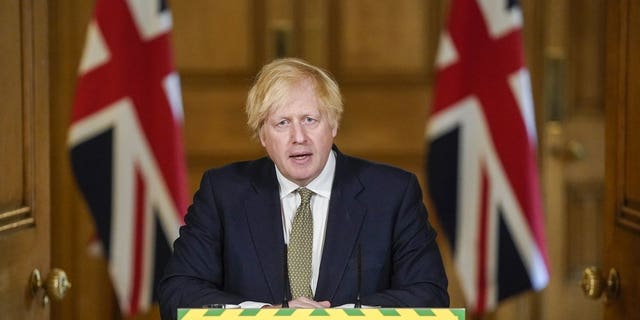 Britain's Prime Minister Boris Johnson speaking during a briefing on the coronavirus in London on Sunday. (Andrew Parsons/10 Downing Street via AP)