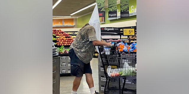 A man was spotted at a California supermarket wearing what appears to be a KKK hood. Courtesy Tiam Tellez