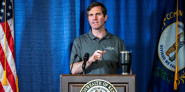 In this Sunday, May 3, 2020, file photo, Kentucky Gov. Andy Beshear speaks during a news conference at the state's Emergency Operations Center at the Boone National Guard Center in Frankfort, Ky., about the coronavirus pandemic. (Ryan C. Hermens/Lexington Herald-Leader via AP)