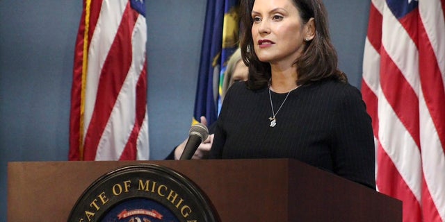 Michigan Gov. Gretchen Whitmer addresses the state during a speech in Lansing, Mich. Some Republican state lawmakers have filed a legal challenge to compel her to reopen the state’s economy amid the coronavirus pandemic.