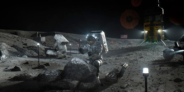 This illustration made available by NASA in April 2020 depicts Artemis astronauts on the Moon. On Thursday, April 30, 2020, NASA announced the three companies that will develop, build and fly lunar landers, with the goal of returning astronauts to the moon by 2024. (NASA via AP)