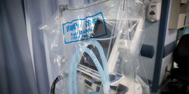 A ventilator waits to be used by a COVID-19 patient going into cardiac arrest at St. Joseph's Hospital in Yonkers, N.Y., in April 2020. (AP Photo/John Minchillo, File)