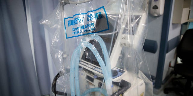 A ventilator waits to be used by a COVID-19 patient going into cardiac arrest at St. Joseph's Hospital in Yonkers, N.Y., in April 2020. (AP Photo/John Minchillo, File)