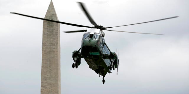 Marine One, with President Donald Trump aboard, approaches the South Lawn of the White House, Sunday, May 3, 2020, in Washington. Trump is returning from a trip to Camp David, Md. (AP Photo/Patrick Semansky)