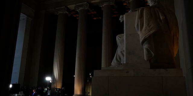 President Donald Trump speaks during a Fox News virtual town hall from the Lincoln Memorial, Sunday, May 3, 2020, in Washington. (AP Photo/Evan Vucci)