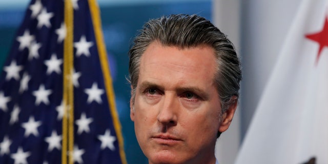 California Gov. Gavin Newsom listens to a reporter's question during his daily news briefing in Rancho Cordova, Calif on April 9. California is expected to be refunded $247 million it paid to a Chinese car company under a major, yet "murky" deal for protective masks, according to state officials on Wednesday.<br data-cke-eol="1">
(AP Photo/Rich Pedroncelli, Pool)