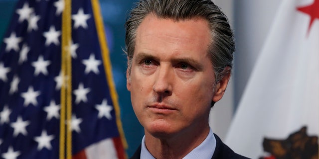 California Gov. Gavin Newsom listens to a reporter's question during his daily news briefing in Rancho Cordova, Calif on April 9. California is expected to be refunded $247 million it paid to a Chinese car company under a major, yet "murky" deal for protective masks, according to state officials on Wednesday.<br data-cke-eol="1">
(AP Photo/Rich Pedroncelli, Pool)
