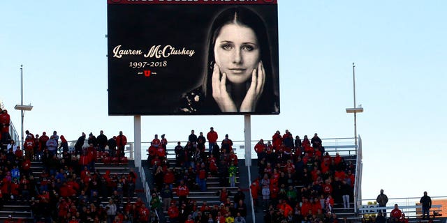 FILE: A photograph of University of Utah student and track athlete Lauren McCluskey, who was fatally shot on campus, is projected on the video board before the start of an NCAA college football game between Oregon and Utah in Salt Lake City.
