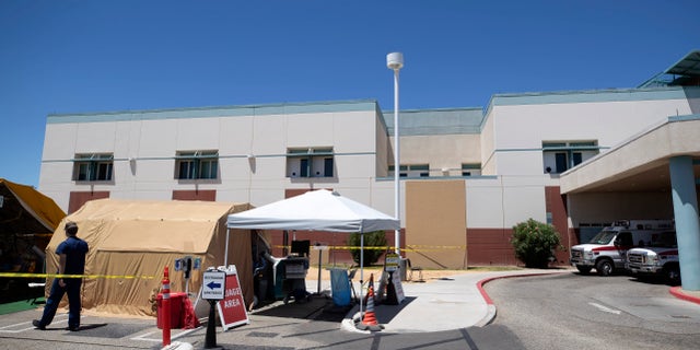 A tent in front of the El Centro Regional Medical Center in California, where staffers help process patients with symptoms related to the coronavirus.