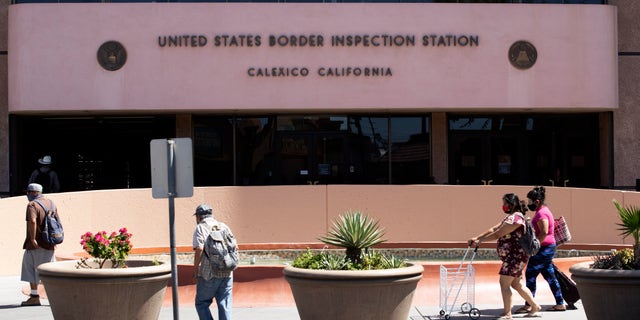 People making their way toward the pedestrian border crossing connecting Calexico, Calif., to Mexicali, Mexico, on Wednesday.