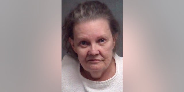 Barbara Watters, a Missouri woman who kept her husband's body in the freezer, is suing to have his remains returned to her. Watters, of Joplin, was charged in November with abandoning a corpse. The charge was later dismissed, but the body has not been returned to her. (Joplin Police Department via AP, File)
