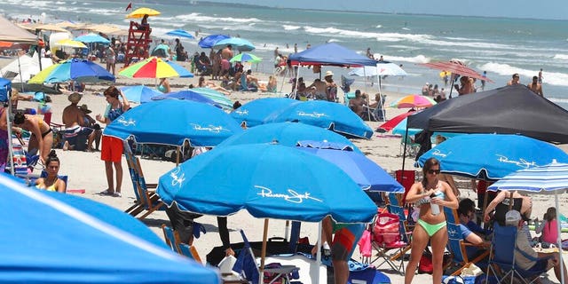 Cocoa Beach, Fla., packed with Memorial Day beachgoers on Saturday. (Stephen M. Dowell/Orlando Sentinel via AP)