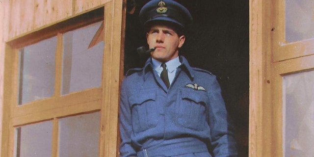 A colorized version of a photo of Alastair Gunn relaxing in the dispersal doorway at RAF Benson in late summer 1941.