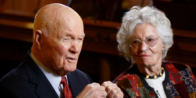 FILE - In this 2015, file photo, former astronaut and U.S. Sen. John Glenn, D-Ohio, left, answers questions with his wife, Annie Glenn, during an interview with The Associated Press at the Ohio Statehouse in Columbus, Ohio.  (AP Photo/Paul Vernon, File)