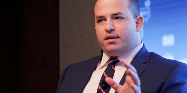 Brian Stelter has a long history of shielding his tiny audience from media stories that make his liberal peers look bad. (REUTERS/Andrew Kelly)