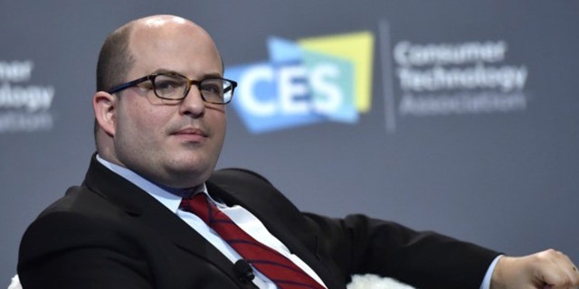 Brian Stelter has mastered the art of making his point by posing it as a question, allowing him to get away with speculating about Trump’s mental health and fitness for office. (Photo by David Becker/Getty Images)