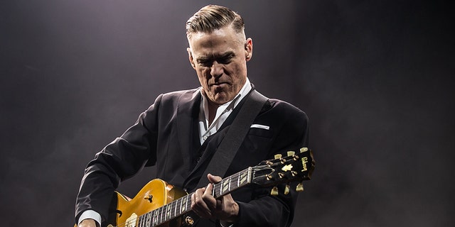 Bryan Adams performs on stage at Motorpoint Arena on March 05, 2019 in Cardiff, Wales.