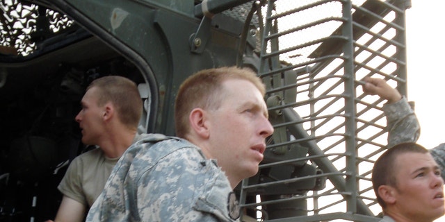 Army Capt. John Hallett is photographed during his time in Afghanistan.
