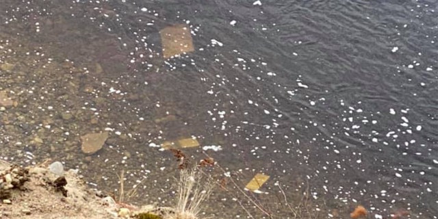Headstones have fallen from the bluff into the river. (Courtesy: Maylynda Emerson)