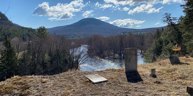 A winding river in northern New Hampshire is eroding the bluff beneath a historic cemetery there. (Courtesy: Maylynda Emerson)