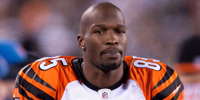 Chad Ochocinco of the Cincinnati Bengals sits on the bench during a game against the New York Jets at New Meadowlands Stadium in East Rutherford, New Jersey, November 25, 2010.