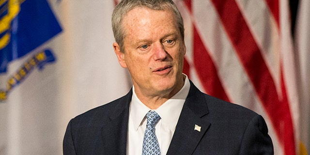 Massachusetts Gov. Charlie Baker gives a press conference on May 11, 2020 in the Gardner Auditorium of the State House over the state's approach to reopening the economy. (Blake Nissen for The Boston Globe via Getty Images)