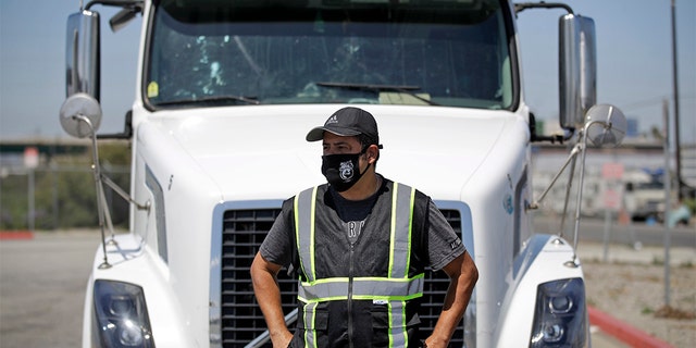 The truck driver said he's had to rely on the state health insurance program.  (AP Photo/Marcio Jose Sanchez)