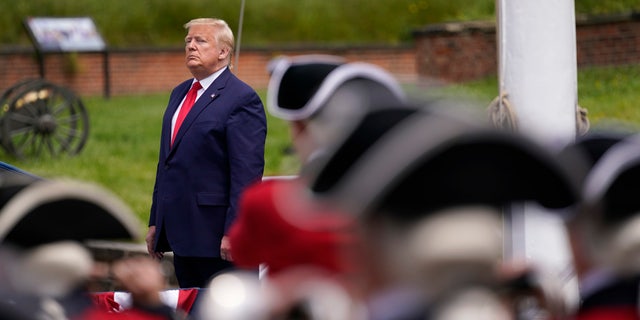 President Donald Trump participates in a Memorial Day ceremony at Fort McHenry National Monument and Historic Shrine, Monday, May 25, 2020, in Baltimore. (AP Photo/Evan Vucci)