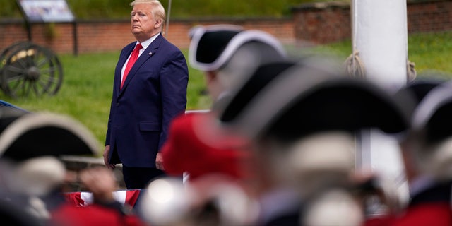 President Donald Trump participates in a Memorial Day ceremony at Fort McHenry National Monument and Historic Shrine, Monday, May 25, 2020, in Baltimore. (AP Photo/Evan Vucci)